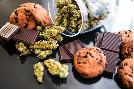 Cannabis and edibles laid out on the table