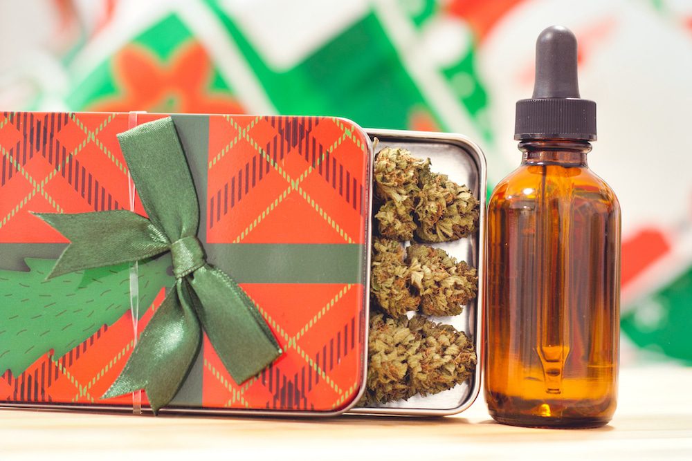 A festive container filled with cannabis and CBD oil