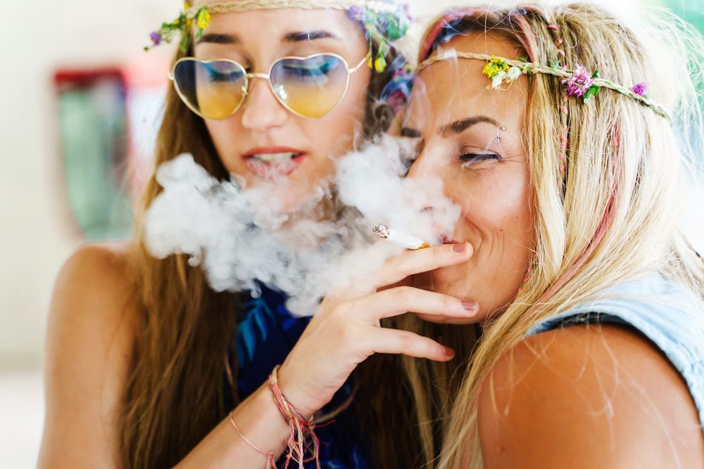 Young women smoking cannabis on spring break