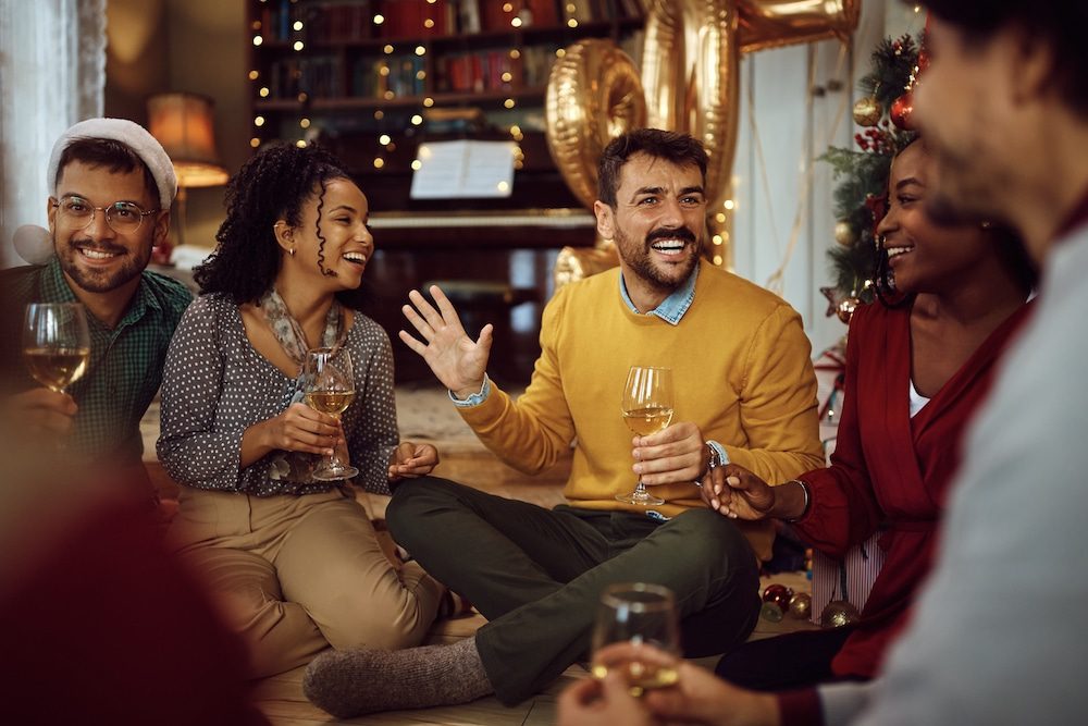 A happy group of friends celebrating the holidays together